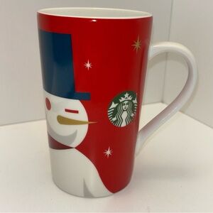 2012 Starbucks 16 oz ceramic holiday Christmas mug with winking snowman